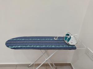 a suitcase sitting on top of a table at Sakeenah Homestay near UUM, UNIMAP and Matrik Kedah in Changlun