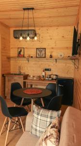 TV a/nebo společenská místnost v ubytování Garden rooms in Kutaisi