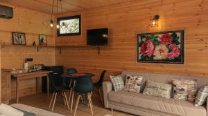 Телевизор и/или развлекательный центр в Garden rooms in Kutaisi