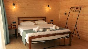 Postel nebo postele na pokoji v ubytování Garden rooms in Kutaisi