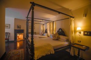 A bed or beds in a room at The Himalayan