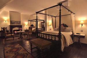 A bed or beds in a room at The Himalayan