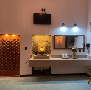 TV a/nebo společenská místnost v ubytování Casa Sofi Oaxaca