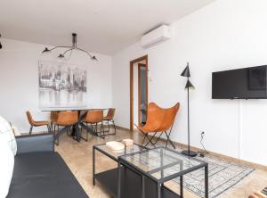 TV a/nebo společenská místnost v ubytování Picasso Suites