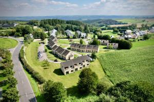 an aerial view of a village with a house at Holiday Park La Sapinière in Hosingen