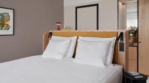 Postel nebo postele na pokoji v ubytování Original Sokos Hotel Royal