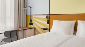 Postel nebo postele na pokoji v ubytování Original Sokos Hotel Royal