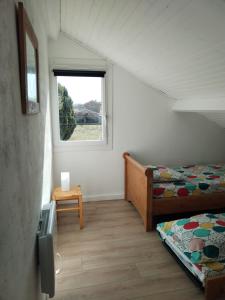 Katil atau katil-katil dalam bilik di Grand et bel appartement idéalement situé ! Parfait pour les familles !