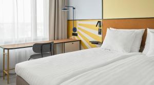 Postel nebo postele na pokoji v ubytování Original Sokos Hotel Royal