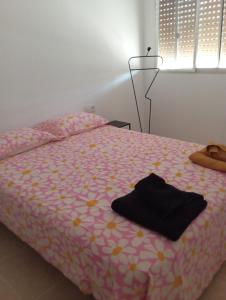 Katil atau katil-katil dalam bilik di Apartamentos Torresmar