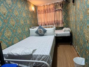 Postel nebo postele na pokoji v ubytování Relaince international hostel