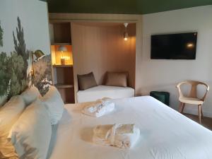 Postel nebo postele na pokoji v ubytování Lykke Hotel & Spa Chamonix - ex Mercure
