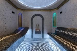 Ένα ή περισσότερα κρεβάτια σε δωμάτιο στο StayInn City Center
