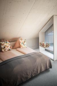 Postel nebo postele na pokoji v ubytování Riedenblick Apartments