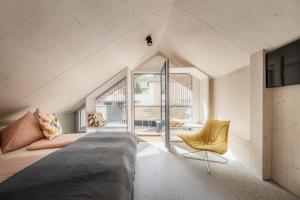 Postel nebo postele na pokoji v ubytování Riedenblick Apartments