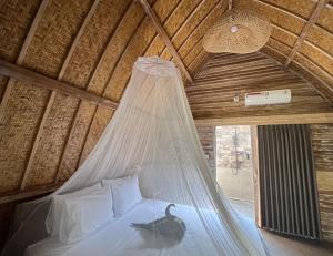 MoonBag Bungalows客房内的一张或多张床位