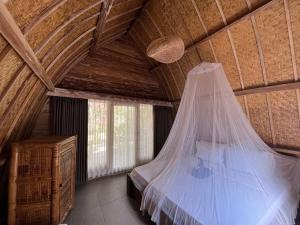 MoonBag Bungalows客房内的一张或多张床位