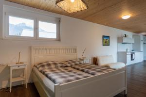 Postel nebo postele na pokoji v ubytování FLEXhome your central, calm and cosy place in Dornbirn