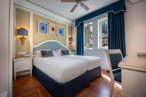 Llit o llits en una habitació de Grand Hotel San Pietro Taormina
