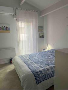Postel nebo postele na pokoji v ubytování Collioure vue imprenable T3 Garage privé
