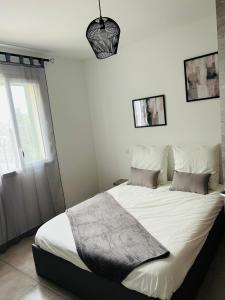 Ένα ή περισσότερα κρεβάτια σε δωμάτιο στο Appartement T2 Corte