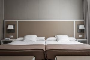 Postel nebo postele na pokoji v ubytování Estival Centurión Playa