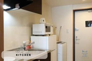 Una cocina o zona de cocina en HOTEL THE POINT Kiyomizu Gojo
