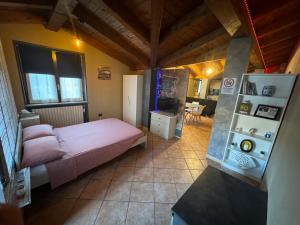 Kuchyň nebo kuchyňský kout v ubytování Stea monolocale loft in villa