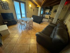 Posezení v ubytování Stea monolocale loft in villa