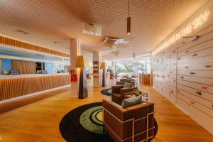 a lobby with couches and a waiting room at Hotel Mona Ex-Eurotel in Montreux