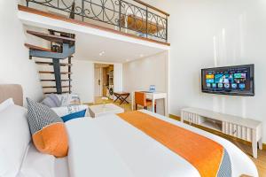 Postel nebo postele na pokoji v ubytování Pangdai International Aparthotel Modiesha Metro Branch