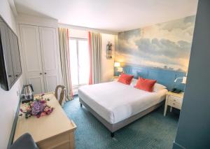 Ein Bett oder Betten in einem Zimmer der Unterkunft Passy Eiffel