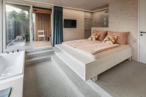 Postel nebo postele na pokoji v ubytování Riedenblick Apartments