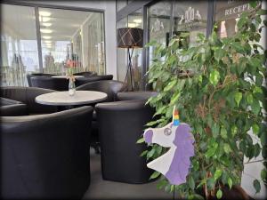 Posezení v ubytování Hotel Unicornis