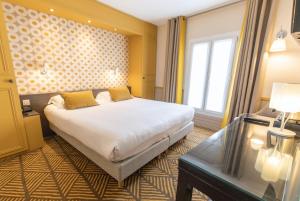 Ein Bett oder Betten in einem Zimmer der Unterkunft Passy Eiffel