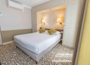 Ein Bett oder Betten in einem Zimmer der Unterkunft Passy Eiffel