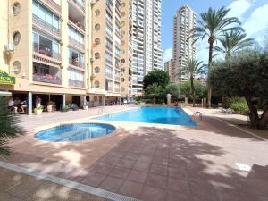 a swimming pool in the middle of a building at MobyDick 5 in Benidorm