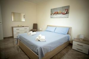 Posteľ alebo postele v izbe v ubytovaní DaniPa House