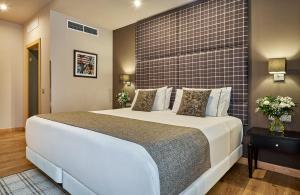 En eller flere senge i et værelse på Hesperia Barcelona Barri Gòtic