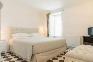Posteľ alebo postele v izbe v ubytovaní Leonardo Trulli Resort