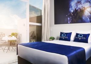 Postel nebo postele na pokoji v ubytování Céu Palmas Hotel