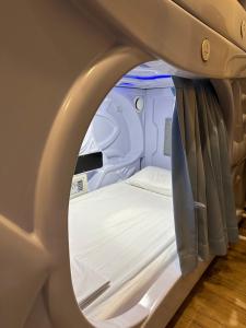 Postel nebo postele na pokoji v ubytování SleepBox Hostel