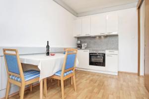 Afbeelding uit fotogalerij van Apartments Weberhof in Egg am Faaker See +40 foto's