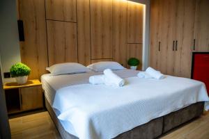 Postel nebo postele na pokoji v ubytování RiA BLU DELUXE HOTEL