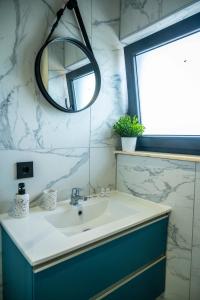 Koupelna v ubytování RiA BLU DELUXE HOTEL