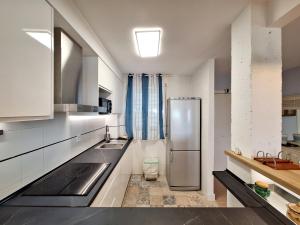 A kitchen or kitchenette at Baria I Adosado
