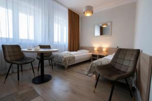 Posteľ alebo postele v izbe v ubytovaní Hotel Polonia