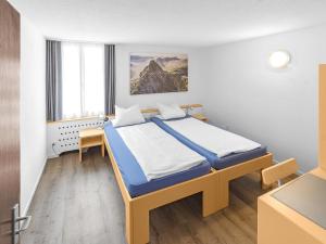 Postel nebo postele na pokoji v ubytování Hirschen Backpacker-Hotel & Pub