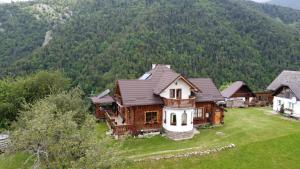 an aerial view of a house in the mountains at Casa Muchia lui Gîrniță in Braşov