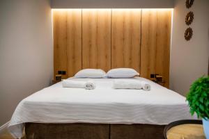 Postel nebo postele na pokoji v ubytování RiA BLU DELUXE HOTEL